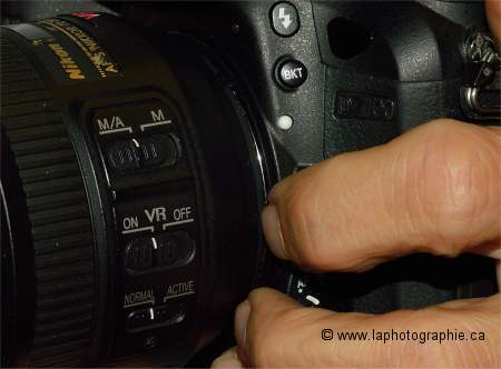 Photo du dévérouillage de l'objectif photo